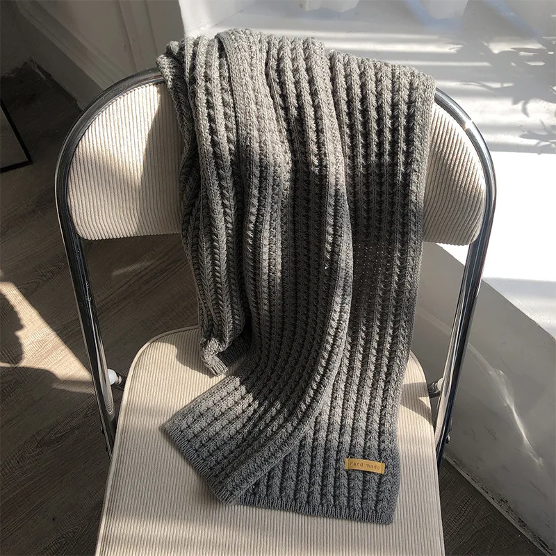 Douce écharpe tricot torsadée