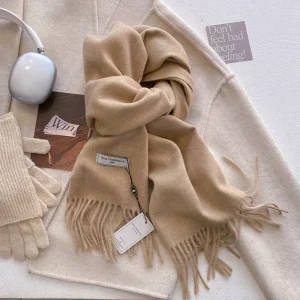 Écharpe femme douce unie multi matière, 200x34cm, accessoire chaud et léger à petit prix, confort et douceur pour toutes.